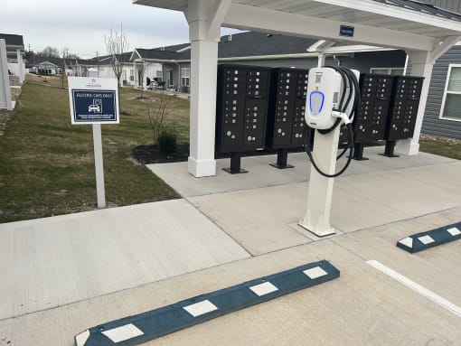 a gas pump in front of a gas station
